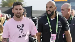 Yassine Chueko and Lionel Messi