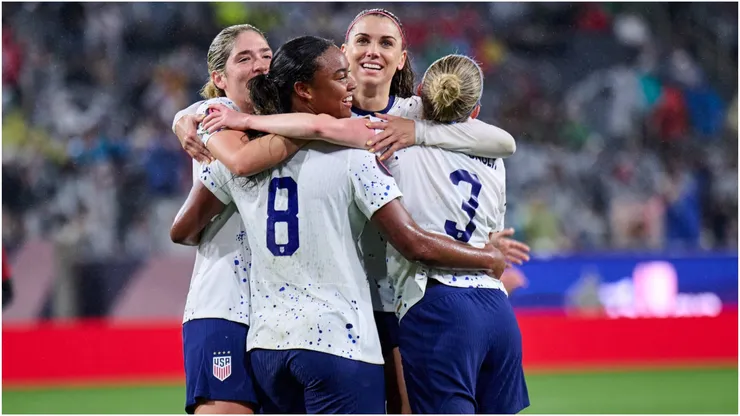 Jaedyn Shaw of United States with her partners