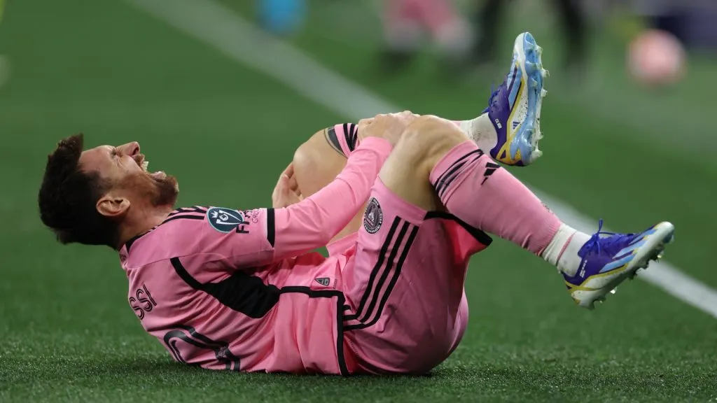 Lionel Messi #10 of Inter Miami CF reacts after suffering an injury against Nashville SC during the second half during the Concacaf Champions Cup Leg One Round of 16 match at GEODIS Park on March 07, 2024 in Nashville, Tennessee.
