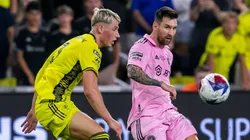 Inter Miami forward Lionel Messi (10) crosses the ball ahead of Nashville SC defender Lukas MacNaughton (3) during the Leagues Cup Final match between Nashville SC and Inter Miami CF on Saturday, August 19, 2023 at GEODIS Park in Nashville, TN.