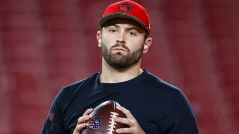 Baker Mayfield looks on before a game.