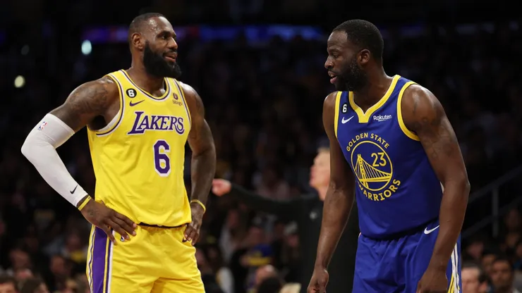 Draymond Green #23 of the Golden State Warriors speaks to LeBron James #6 of the Los Angeles Lakers during the first quarter in game six of the Western Conference Semifinal Playoffs at Crypto.com Arena on May 12, 2023 in Los Angeles, California.