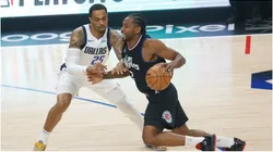 Los Angeles Clippers Kawhi Leonard (R) is defended by Dallas Mavericks P.J. Washington