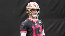 Brock Purdy #13 looks on during San Francisco 49ers practice ahead of Super Bowl LVIII at Fertitta Football Complex on February 09, 2024 in Las Vegas, Nevada.