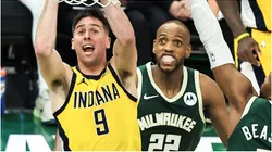 T.J. McConnell (top L) of Indiana Pacers shoots the ball