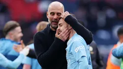 Pep Guardiola and Bernardo Silva of Manchester City