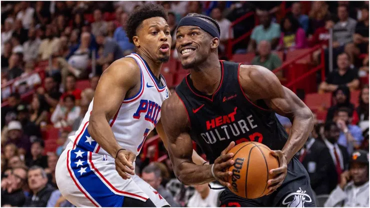 Miami Heat forward Jimmy Butler (22) drives past Philadelphia 76ers guard Kyle Lowry