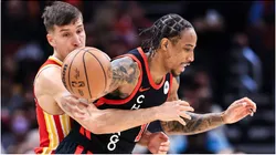 Atlanta Hawks guard Bogdan Bogdanovic (L) vies against Chicago Bulls forward DeMar DeRozan
