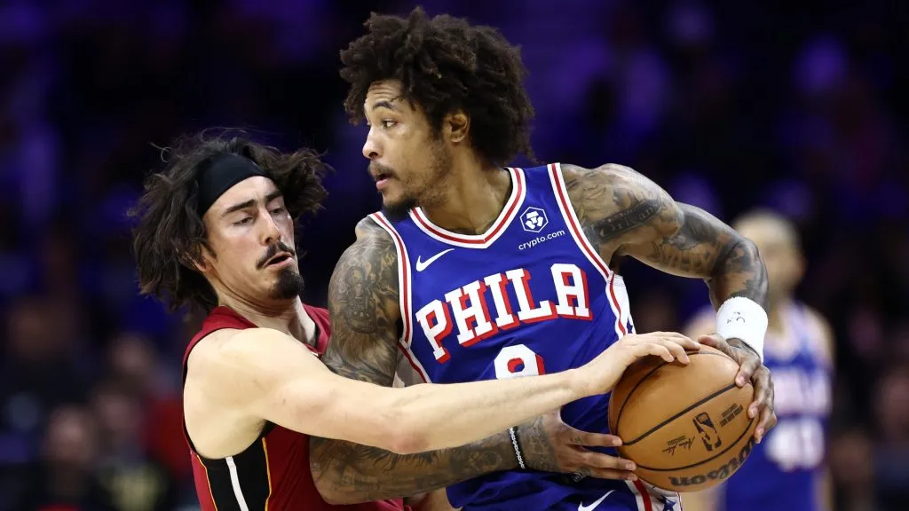 Jaime Jaquez Jr. #11 of the Miami Heat guards Kelly Oubre Jr. #9 of the Philadelphia 76ers during the third quarter at the Wells Fargo Center on March 18, 2024 in Philadelphia, Pennsylvania.