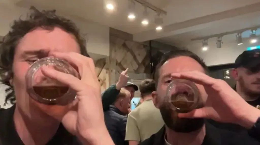 Wrexham players having a drink.