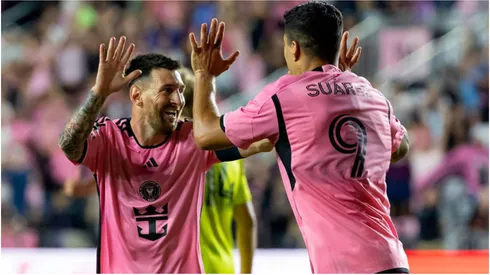 Inter Miami forward Lionel Messi celebrates with Luis Suarez