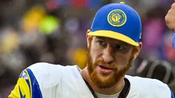 Carson Wentz looks on during a game from the sidelines.