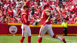 Patrick Mahomes #15 of the Kansas City Chiefs high fives teammate Nick Allegretti #73 after an extra point during the first quarter of the game against the Washington Commanders at Arrowhead Stadium on August 20, 2022 in Kansas City, Missouri.