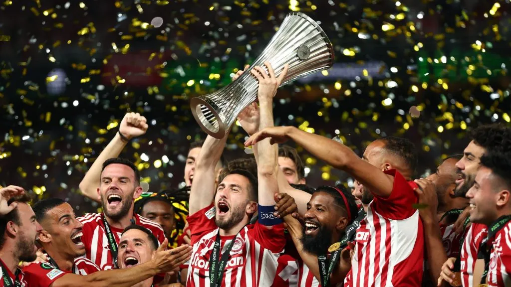 Kostas Fortounis of Olympiacos lifts the UEFA Europa Conference League Trophy after his team's victory in the UEFA Europa Conference League 2023/24 final match between Olympiacos FC and ACF Fiorentina at AEK Arena on May 29, 2024 in Athens, Greece.