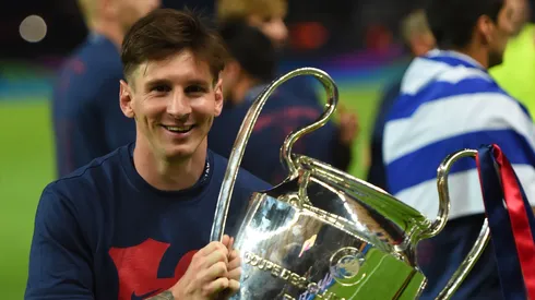Lionel Messi of Barcelona celebrates with the trophy after the UEFA Champions League Final between Juventus and FC Barcelona at Olympiastadion on June 6, 2015 in Berlin, Germany.