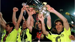 Andreas Möller, Jürgen Kohler, Martin Kree and Karlheinz Riedle hold up the Champions League trophy