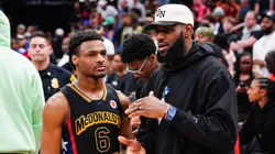 Bronny James #6 of the West team talks to LeBron James of the Los Angeles Lakers after the 2023 McDonald's High School Boys All-American Game at Toyota Center on March 28, 2023 in Houston, Texas.