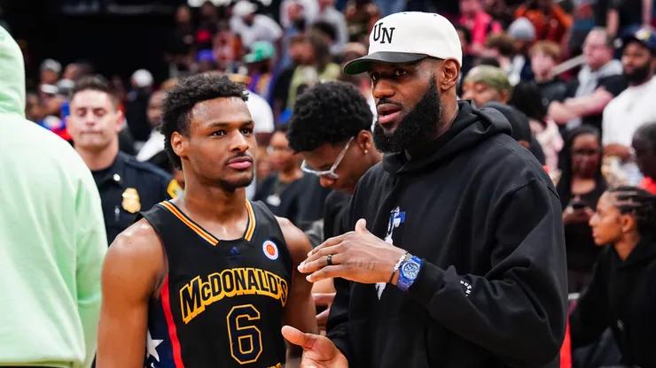 Bronny James #6 of the West team talks to LeBron James of the Los Angeles Lakers after the 2023 McDonald's High School Boys All-American Game at Toyota Center on March 28, 2023 in Houston, Texas.
