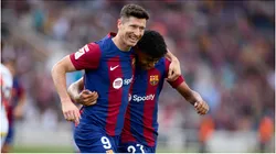 Robert Lewandowski of FC Barcelona celebrate with teammate