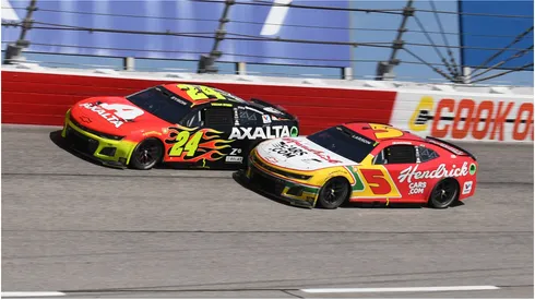 Kyle Larson and William Byron race side by side