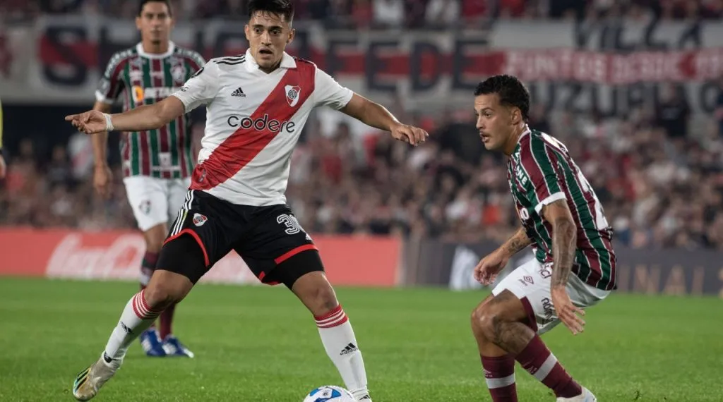 Pablo Solari of River Plate and Claudio Rodrigues Gomes, known as Guga (R) of Fluminense seen in action during a Copa CONMEBOL Libertadores 2023 group D match between River Plate and Fluminense at Estadio Mas Monumental Antonio Vespucio Liberti.