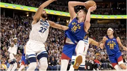 Rudy Gobert (27) of the Minnesota Timberwolves defends Nikola Jokic (25) of the Denver Nuggets