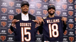Chicago Bears rookies Rome Odunze and Caleb Williams holding their jerseys