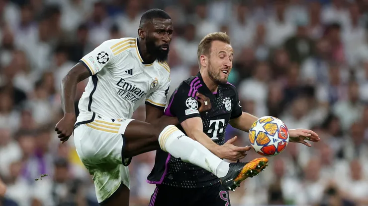 Harry Kane of Bayern Munich is challenged by Antonio Ruediger of Real Madrid during the UEFA Champions League semi-final second leg match between Real Madrid and FC Bayern München at Estadio Santiago Bernabeu on May 08, 2024 in Madrid, Spain.