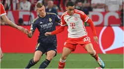 Toni Kroos of Real Madrid and Jamal Musiala of Bayern Munich