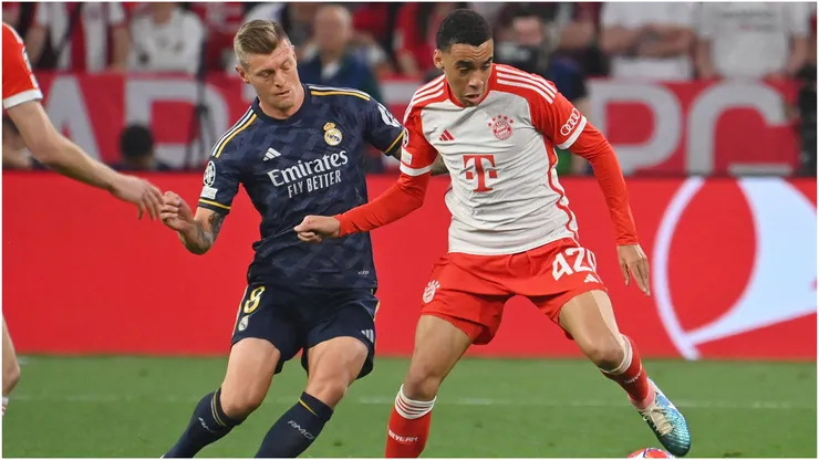 Toni Kroos of Real Madrid and Jamal Musiala of Bayern Munich