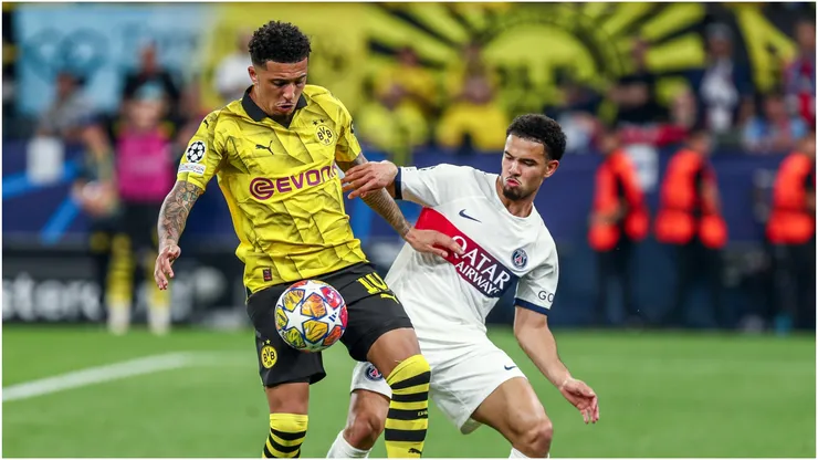 Jadon Sancho of Borussia Dortmund in duel against Zaire Emery of PSG
