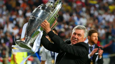 Head Coach, Carlo Ancelotti of Real Madrid celebrates with the Champions League trophy during the UEFA Champions League Final between Real Madrid and Atletico de Madrid at Estadio da Luz on May 24, 2014.