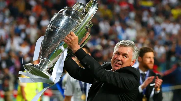 Head Coach, Carlo Ancelotti of Real Madrid celebrates with the Champions League trophy during the UEFA Champions League Final between Real Madrid and Atletico de Madrid at Estadio da Luz on May 24, 2014.