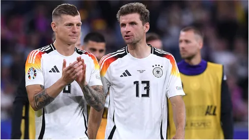 Toni Kroos and Thomas Müller of Germany