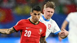 Joao Cancelo defending a ball against Pavel Sulc