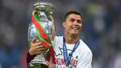 Cristiano Ronaldo of Portugal holds the Henri Delaunay trophy to celebrate after his team's 1-0 win against France in the UEFA EURO 2016 Final match between Portugal and France at Stade de France on July 10, 2016 in Paris, France.