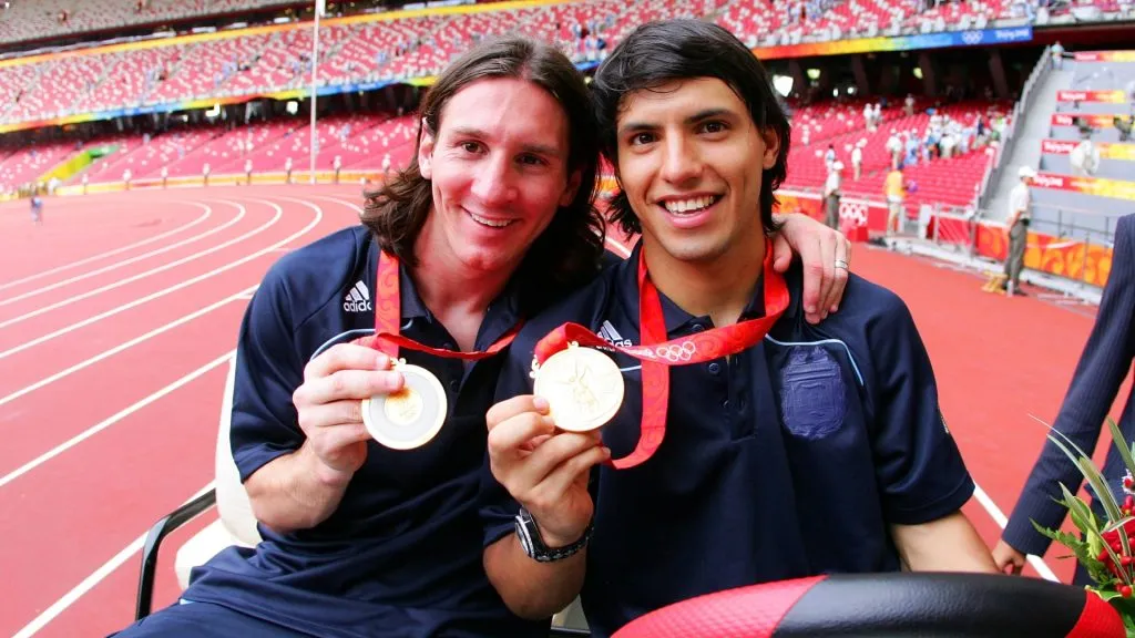 Argentinian forwards Lionel Messi (L) and Sergio Aguero gold medal pose during the men's Olympic football tournament medal ceremony at the national stadium in Beijing during the Men's Final between Nigeria and Argentina at the National Stadium on Day 15 of the Beijing 2008 Olympic Games on August 23, 2008 in Beijing, China.