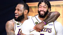 LeBron James #23 of the Los Angeles Lakers and Anthony Davis #3 of the Los Angeles Lakers react after winning the 2020 NBA Championship in Game Six of the 2020 NBA Finals at AdventHealth Arena at the ESPN Wide World Of Sports Complex on October 11, 2020 in Lake Buena Vista, Florida.