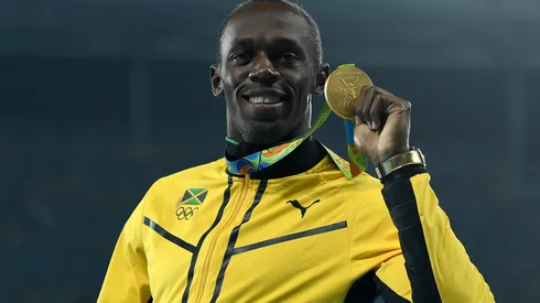 Gold medalist, Usain Bolt of Jamaica, poses on the podium during the medal ceremony for the Mens 200m on Day 14 of the Rio 2016 Olympic Games at the Olympic Stadium on August 19, 2016 in Rio de Janeiro, Brazil.