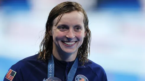 Katie Ledecky of Team United States poses with her medal following the Medal Ceremony after the Women's 400m Freestyle Final on day one of the Olympic Games Paris 2024.