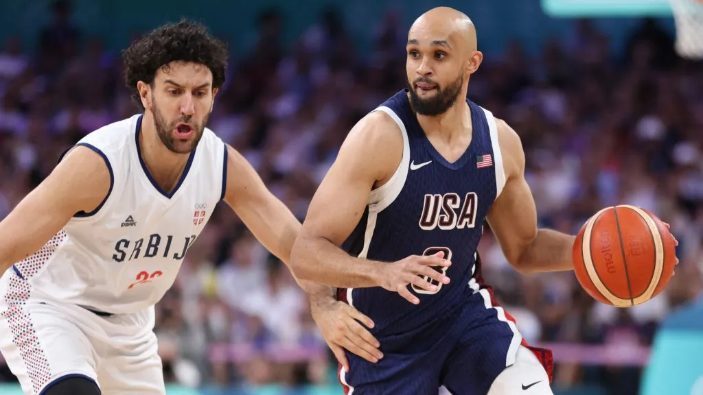 Derrick White #8 of Team United States drives to the basket against Vasilije Micic #22 of Team Serbia during the second half of the Menās Group Phase ā Group C game between Serbia and the United States. Gregory Shamus/Getty Images