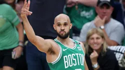 Derrick White #9 of the Boston Celtics reacts after a three point basket against the Dallas Mavericks during the first quarter of Game Five of the 2024 NBA Finals