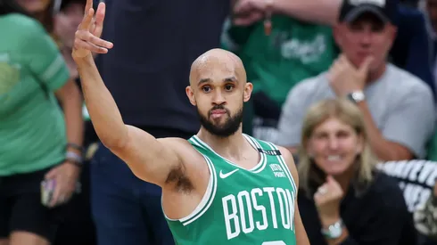 Derrick White #9 of the Boston Celtics reacts after a three point basket against the Dallas Mavericks during the first quarter of Game Five of the 2024 NBA Finals