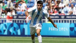 Thiago Almada #10 of Team Argentina runs with the ball during the Men's group B match between Argentina and Iraq during the Olympic Games Paris 2024.