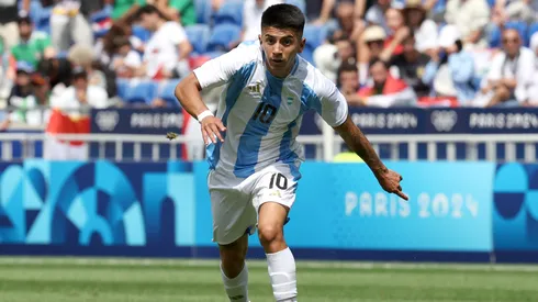 Thiago Almada #10 of Team Argentina runs with the ball during the Men's group B match between Argentina and Iraq during the Olympic Games Paris 2024.