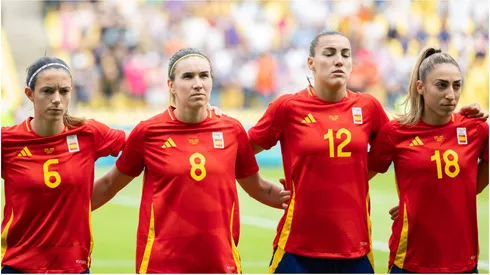 Players of Spain are seen during the national anthem