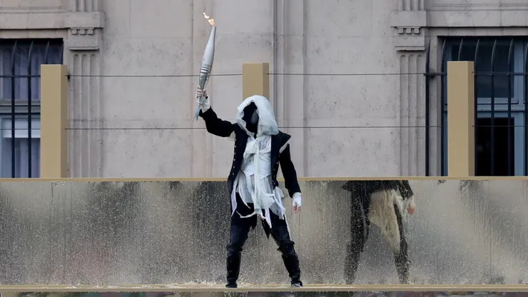 Masked man at the Paris 2024 Olympics opening ceremony