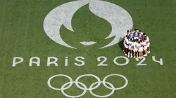 Players of Team France enter a huddle prior to the Men's Rugby Sevens Pool C Group match between France and United States on Day -2 of the Olympic Games Paris 2024 at Stade de France on July 24, 2024 in Paris, France.