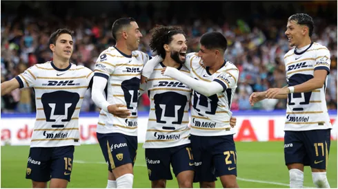 Pumas UNAM players celebrate after scoring