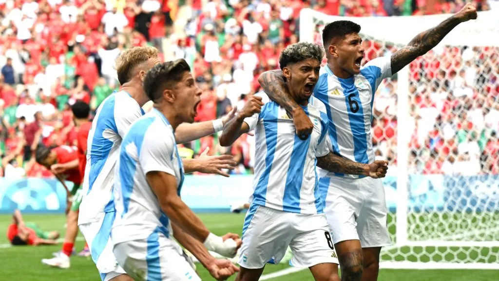 Cristian Medina #8 of Team Argentina celebrates scoring his team’s second goal with teammates during the Men’s group B match between Argentina and Morocco during the Olympic Games Paris 2024 at Stade Geoffroy-Guichard on July 24, 2024 in Saint-Etienne, France. (Photo by Tullio M. Puglia/Getty Images)